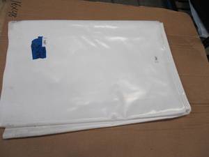 lot 167 image: NEW Vinyl Tarp - 5 x 25 White  White Vinyl tarp - 20 oz. Heavyweight Duty