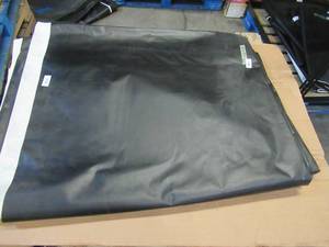 lot 176 image: NEW Vinyl Tarp - 13 x 54 Black  White Vinyl tarp - 13 oz. Mediumweight Duty
