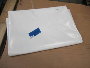 lot 213 image: NEW Vinyl Tarp - 10 x 14 White  White Vinyl tarp - 20 oz. Heavyweight Duty