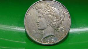 lot 16 image: 1923D Peace Silver Dollar