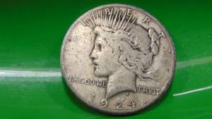 lot 25 image: 1924 Peace Silver Dollar
