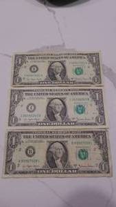 lot 34 image: 3- 1 Dollars, 1977A