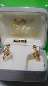 lot 45 image: Black Hills 14Kt Gold Clip Earnings, .56 DWT