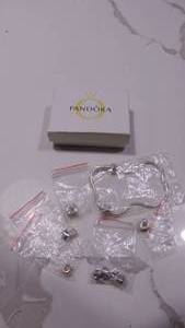 lot 50 image: Pandora Bracelet and Charms