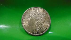 lot 54 image: 1887S Morgan Silver Dollar