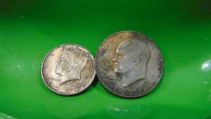 lot 57 image: 1972D Eisenhower Dollar and 1964D Kenndy Half Dollar