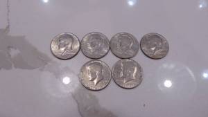 lot 60 image: 4-1976D and 2-1976 Kenndy Half Dollars