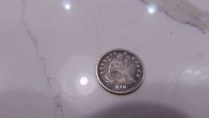 lot 64 image: 1861 Seated Liberty Quarter