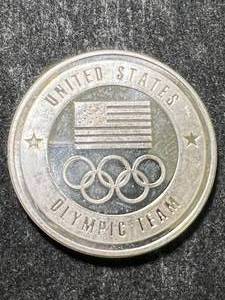 lot 08 image: 1 TROY OZ .999 FINE SILVER US OLYMPIC TEAM ROUND