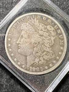 lot 22 image: 1882 US MORGAN SILVER DOLLAR IN CASE