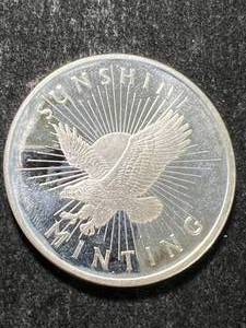 lot 56 image: 1 TROY OZ .999 FINE SILVER SUNSHINE MINTING ROUND