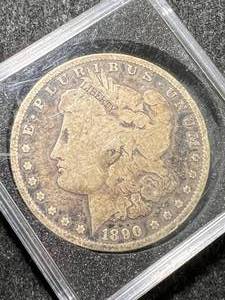 lot 59 image: 1890-O US MORGAN SILVER DOLLAR IN CASE