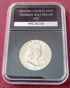 lot 35 image: Nice Uncirculated 1957-D Franklin Half Dollar