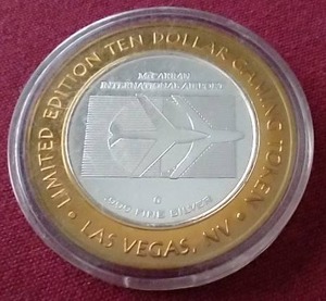 lot 66 image: McCarron Airport Las Vegas $10 Silver Strike Gaming Token