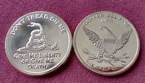 lot 88 image: (2) Dont Tread on Me 1 oz Copper Rounds