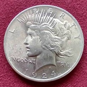 lot 106 image: Nice 1924 Peace Dollar