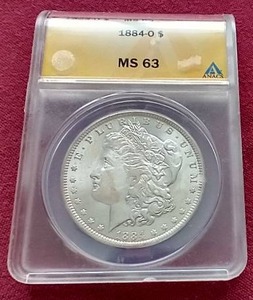 lot 119 image: 1884-O Morgan Dollar - ANACS MS63