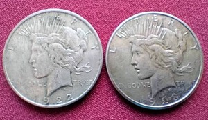 lot 79 image: (2) Peace Dollars - 1922 & 1923