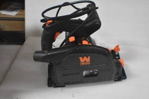 lot 64 image: WEN CT1065 10-Amp 6.5-Inch Plunge Cut Sidewinder Circular Track Saw