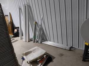 lot 22 image: Assorted Tent Parts...