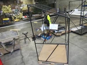 lot 117 image: Welded Black Metal Frame Built to Fit Onto Pallets with Angled Roof - Perfect for Projects