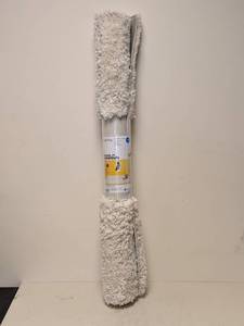 lot 75 image: NEW ROOM ESSENTIALS AREA RUG (IVORY SHAG)