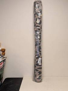 lot 88 image: NEW THRESHOLD AREA RUG (LEOPARD PRINT)