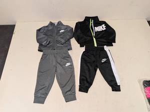 lot 190 image: NEW NIKE BABY JOGGING SUITS (12M) BLACK AND GRAY