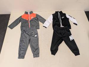 lot 192 image: NEW NIKE BABY JOGGING SUITS (12M) GRAYORANGE AND BLACK