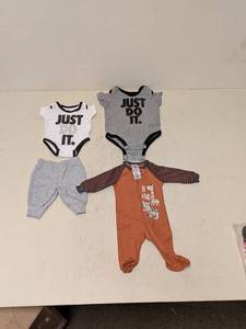 lot 191 image: NEW NIKE AND ASSORTED BABY ITEMS