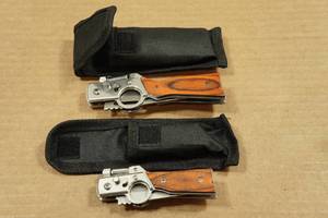 lot 67 image: 2 Gun Shaped Folding Knives with Lights