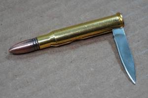 lot 69 image: Bullet Shaped Folding Knife