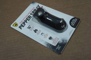 lot 93 image: Guard Dog Pepper Spray Keychain