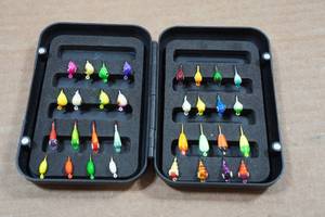 lot 127 image: 32 Glow in the Dark Ice Fishing Jigs with Case