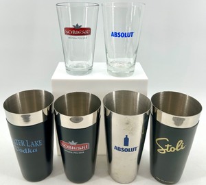 lot 121 image: Stainless Shakers - Sobieski, Absolut, Stolichnaya & Water Lake - 3 sets of each - NIB