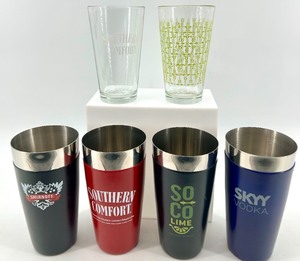 lot 123 image: 4 Brand logos featured Smirnoff, Southern Comfort, SoCo Lime, SKYY Vodka.- 3 sets of each - NIB