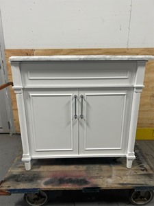 lot 20 image: Aberdeen 36 in. W x 22 in. D x 34.5 in. H Bath Vanity in White with White Carrara Marble Top MSRP $1199