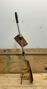 lot 168 image: 1m Circ. (31.75 cm Dia.) Metric Structo-Cast  Measuring Wheel