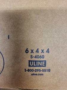lot 48ZA image: Stack of Uline 6x4x4 Corrugated Shipping Boxes S-4060