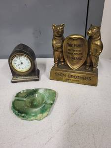 lot 73SC image: Lot of 3 Vintage Items New Haven Desk Clock, Baer Brothers Two Bears Brass Advertising Figure, Green Stone Ashtray
