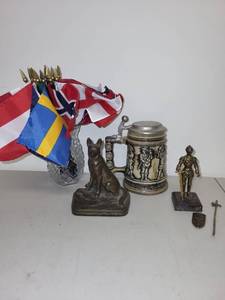 lot 25L image: Vintage German Beer Stein, Brass Knight Figure, Dog Bookend, and Miniature Flag Set
