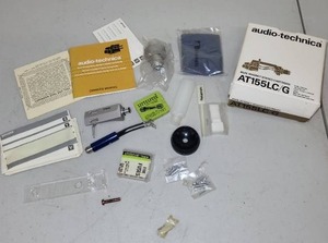 lot 28L image: Turntable Accessory Lot Including Headshell, Fuses, Manuals, and Audio-Technica AT15SLC Box
