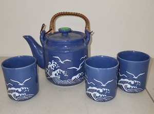 lot 34L image: Blue Ceramic Teapot and 3 Cup Set with Wave and Seagull Design