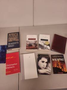 lot 84L image: Collection of 9 Books and Notebook Including Cornwell, McCarthy, Dopesick, and More