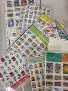 lot 27AE image: Collection of Vintage Wildlife Stamp Sheets, Comics, and Ephemera