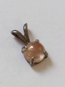 lot 20Q image: Sterling Silver Pendant with Round Pink Stone