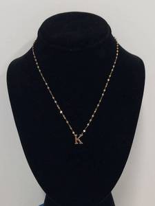 lot 22Q image: Gold-Tone Sterling Silver K Necklace