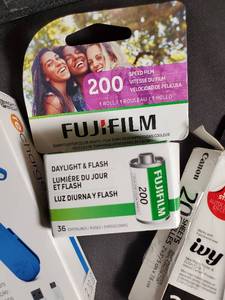 lot 50 image: FujiFilm 200 Color Film Roll - Canon Ivy Photo Paper (20) - LED Booklight & Hooks