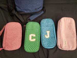 lot 116 image: Zipper Pouch Set - Glitter Pink & Green with C & Blue with J & Pink Solid