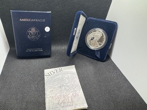 lot 11 image: Better Date 1994 Proof Silver American Eagle in Original Mint Box with COA Greysheet Wholesale Price - $114.00